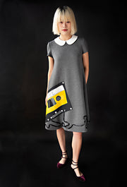 George tent dress sewing pattern. Designed by an independent pattern company. View A with collar and inset sleeves. Sample is made with grey neoprene and includes a hand painted 'mix tape' with ribbon. Front view